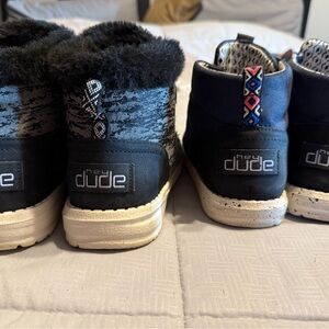2 pair of woman’s size 5  Hey Dudes shoe boots 1 black w/fur 1 navy color